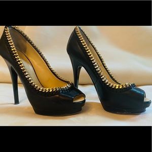 Beautiful black leather pumps with gold chain peep toe.